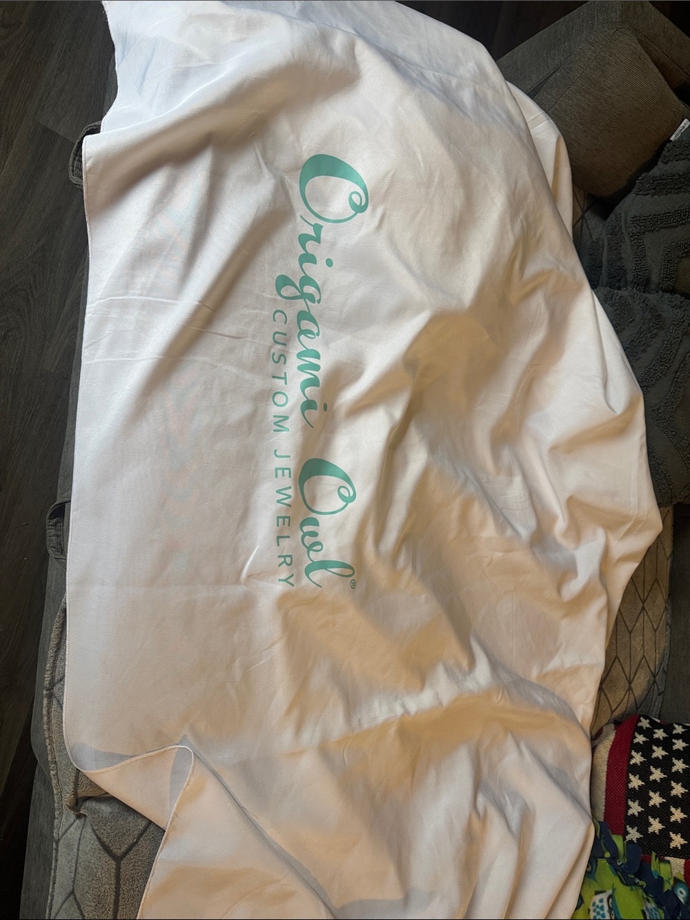 Origami Owl White round tablecloth with Teal Logo